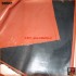 Rubber sheeting - black and clinical red - mack. rubber - 85 cm wide - 0.48 mm thick